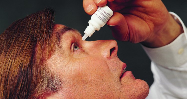 Man Administering Eye Drops