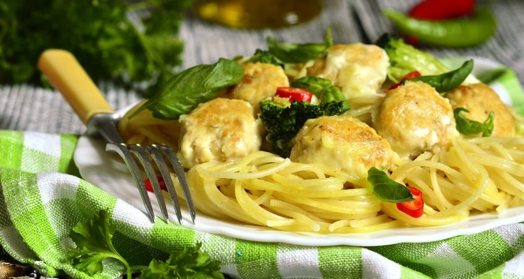 Spaghetti with chicken meatballs and broccoli.