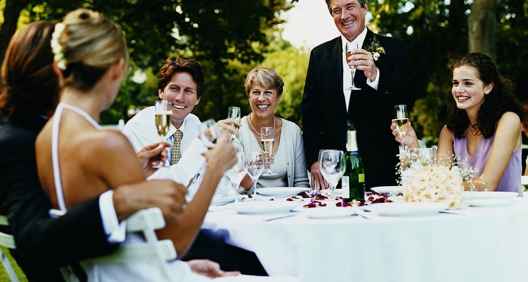 Father Giving a Proposing a toast to the Bride and Groom at a Wedding Reception in a Garden