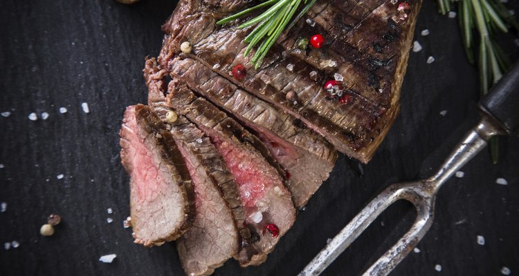 Beef steak on wooden table