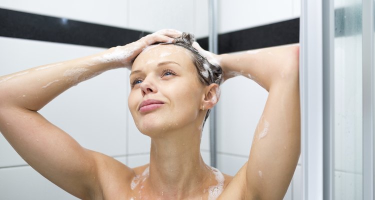 Young woman taking a shower