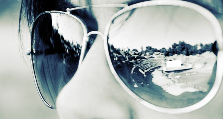 Spanish archaeological site reflected in woman's sunglasses