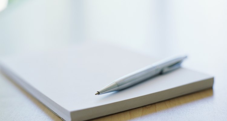 close-up of a pen on a notebook