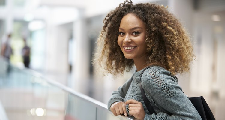 Smiling mixed race young woman looking to camera