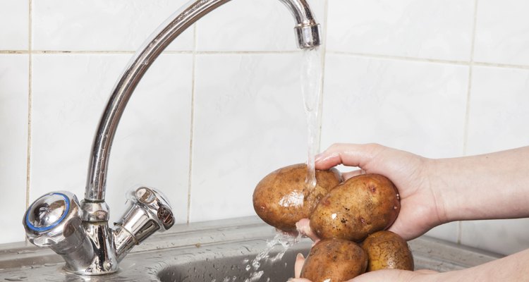 Wash vegetables under running water