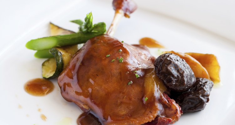 Roast duck thigh with sweet fruit sauce.