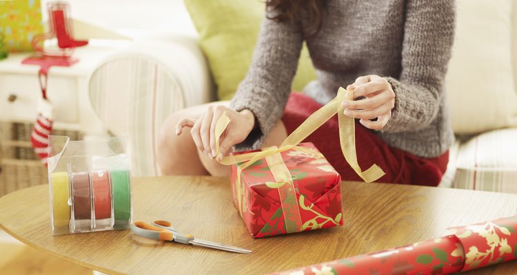 Close-Up of Woman Wrapping Christmas Presents