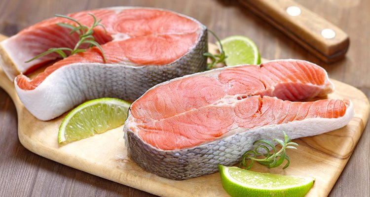 Raw red salmon steaks