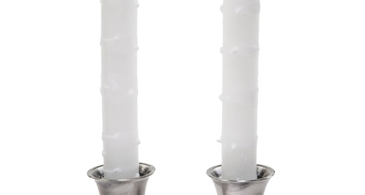 Traditional classic or Victorian silver holloware candlesticks add a touch of class.