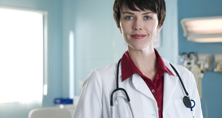 Female doctor in hospital room, portrait