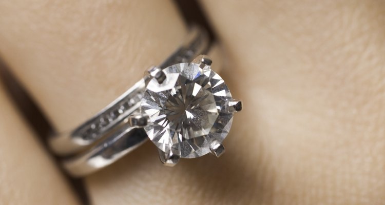 Close-up of a diamond ring on a woman's finger