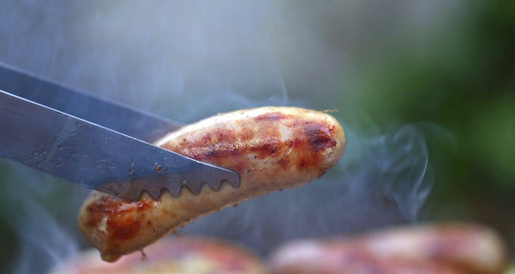 barbecue tongs with sausege