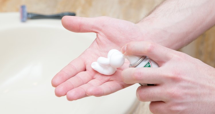 Man spraying shaving foam