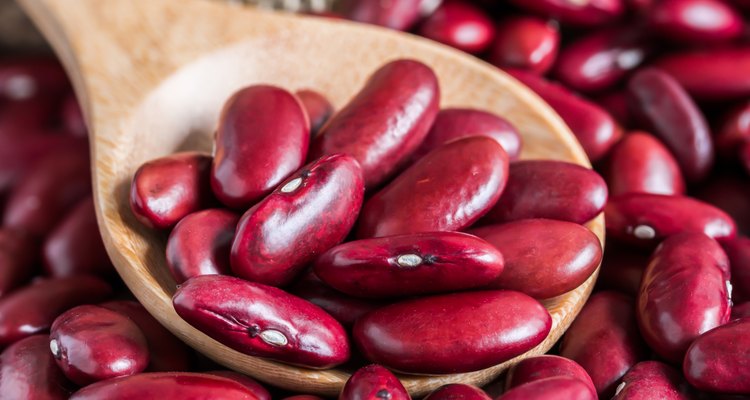close-up red kidney bean in wood spoon