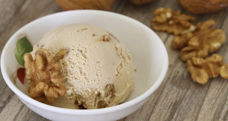 Walnut ice cream scoop in porcelain bowl