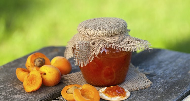 apricot jam on a wooden bowl