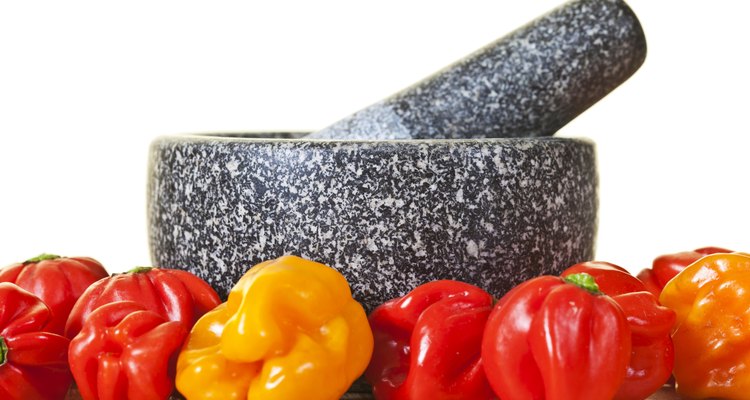 Mortar And Pestle With Scotch Bonnet Peppers