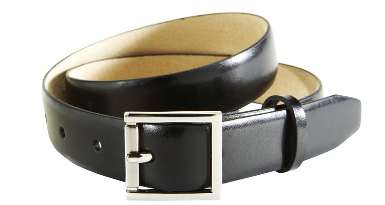 Leather belt on white background