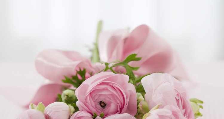 Women wear flower bracelet corsages at special events.