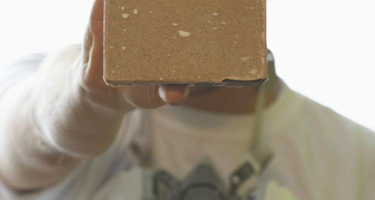 Be sure to sand the surface well before covering the wallpaper.