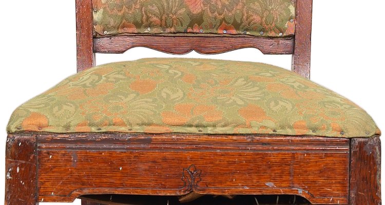 A chair with a fixed seat can be covered with a fresh fabric.