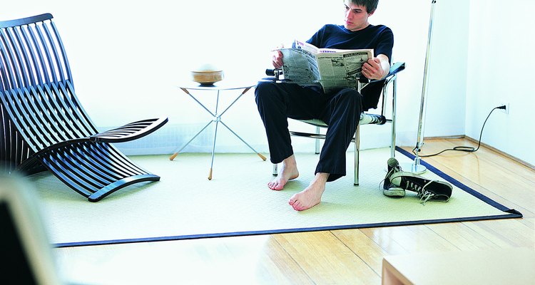 Clean sticky film off of your laminate floor with vinegar.