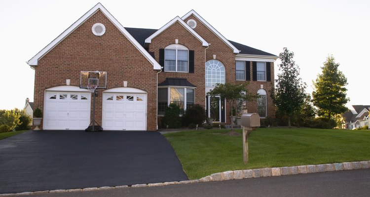 Sealant gives an asphalt driveway a glossy sheen.