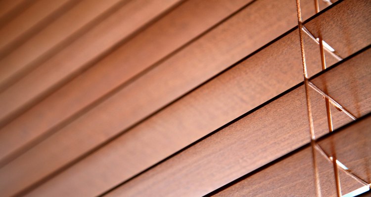 Wood blinds provide shade from outside light.