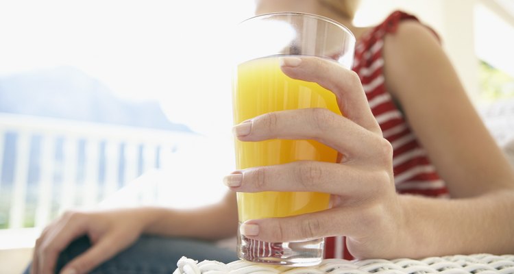 Woman Drinking Orange Juice