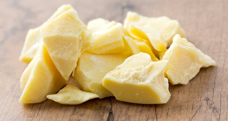 cocoa butter isolated on wooden surface