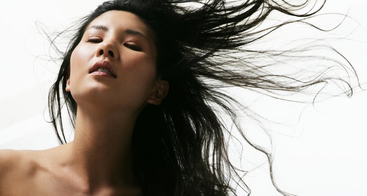 Asian woman, hair blowing