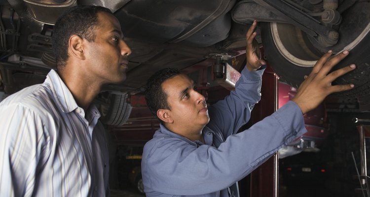 Man assessing tyre