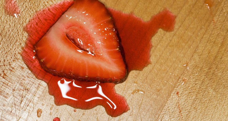 Sliced strawberry on wood cutting-board