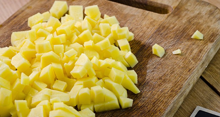 potatoes on a wooden board