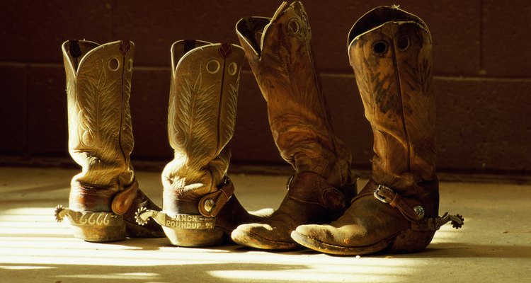 Close-up of two pairs of cowboy boots