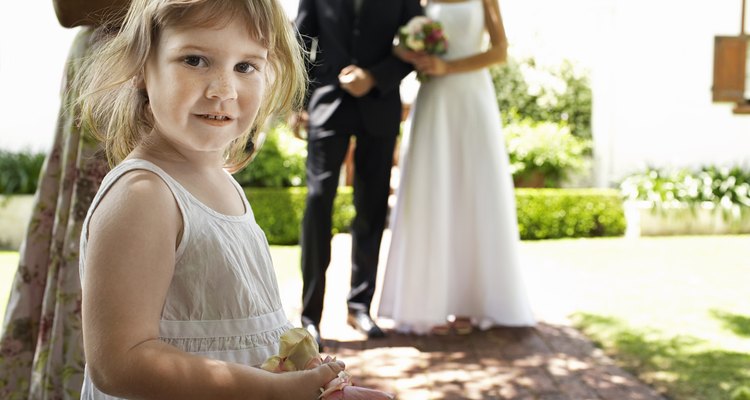 Flower Girl Holding Petals