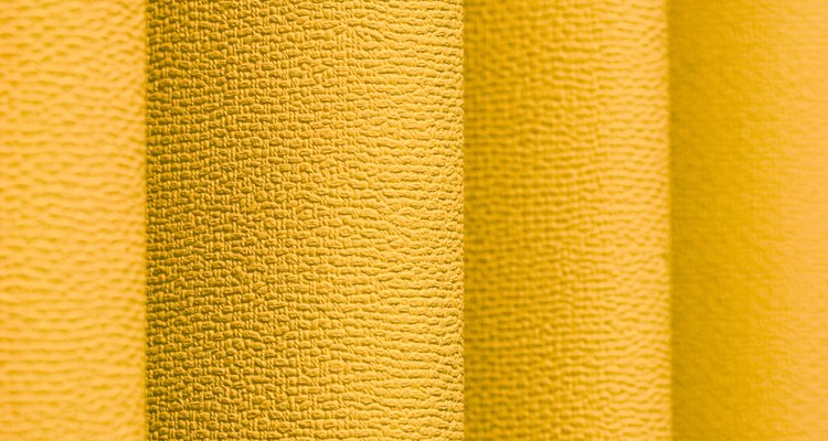 Use fabric to decorate vertical blinds.