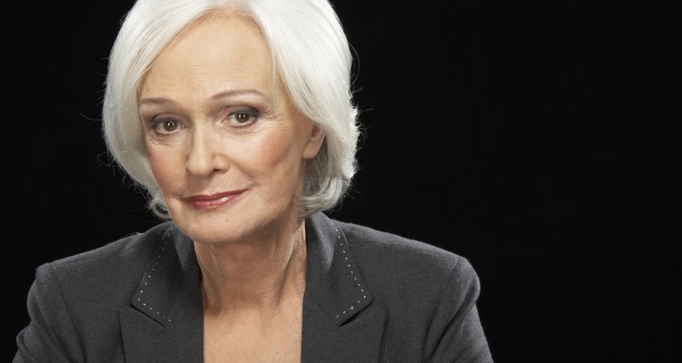 Senior businesswoman smiling, portrait, close-up