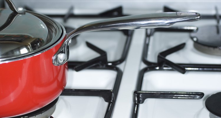 Using a pot or frying pan with a glass cover or lid will allow you to see the clams open as they cook.