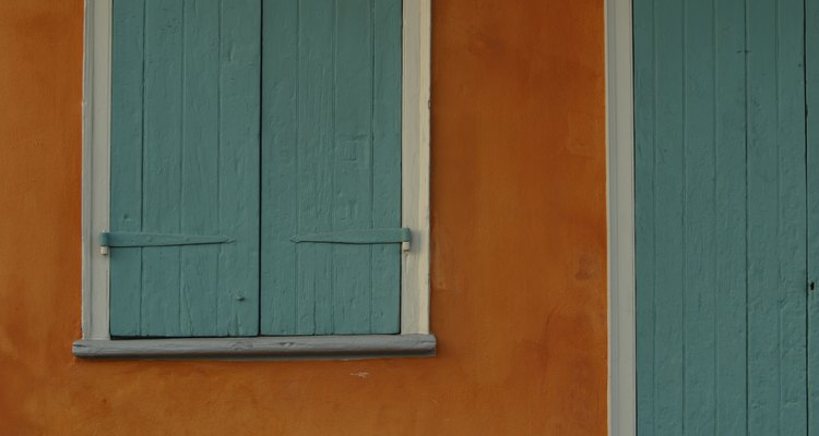 Teal and aubergine work well as accent colours for bright orange.
