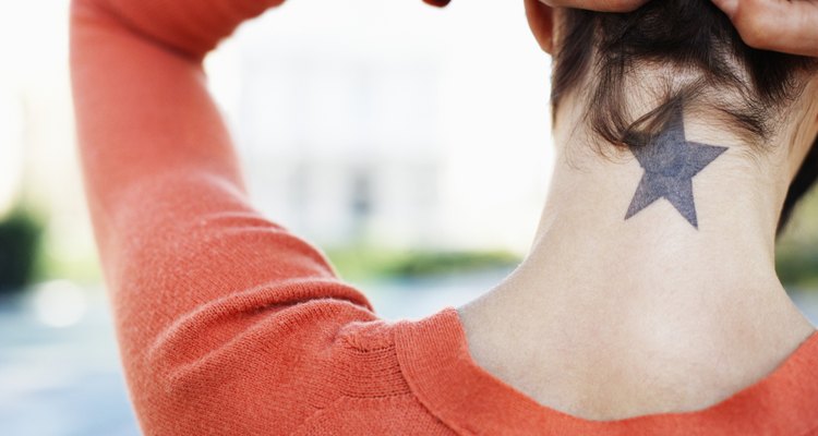 Woman Showing Her Star Tattoo