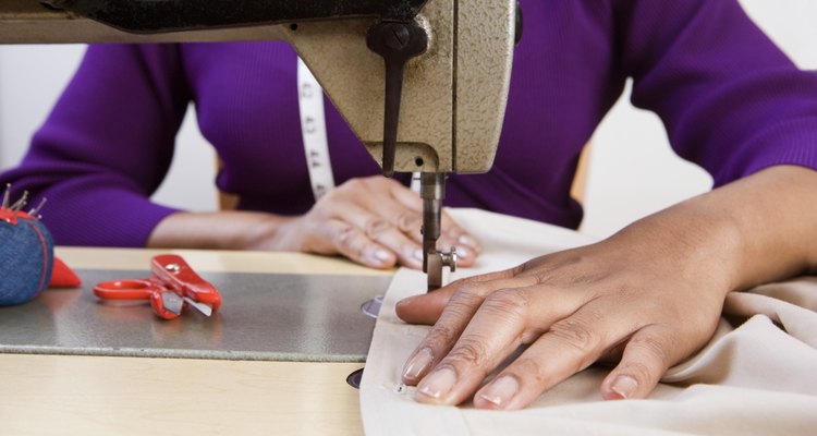 Woman using sewing machine