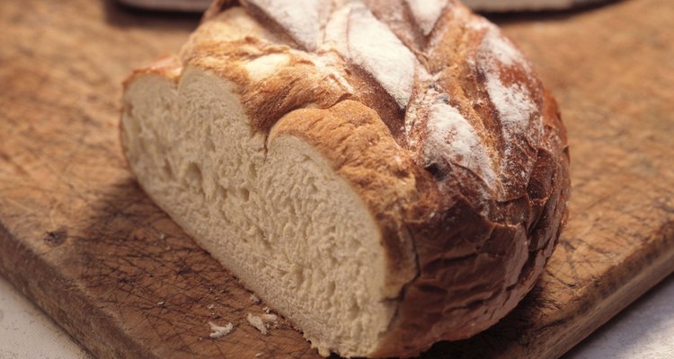 Loaf of bread on cutting board