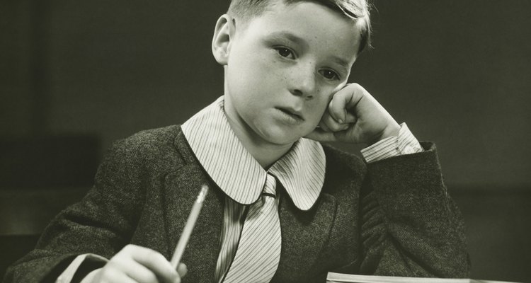 Small boys often wore a tie and a shirt with a Peter Pan collar to a British school.