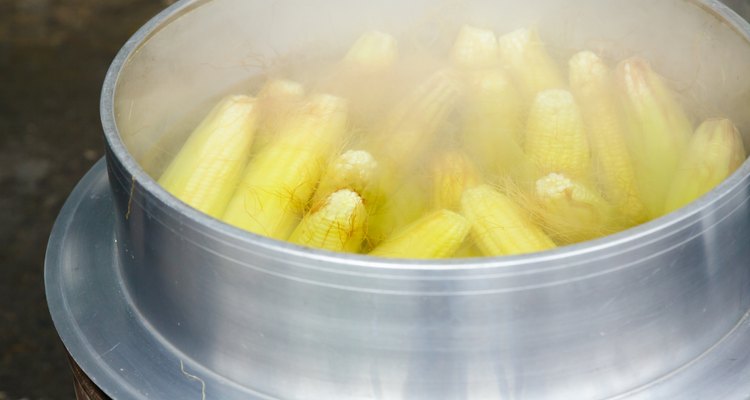 Boiling corn cobs