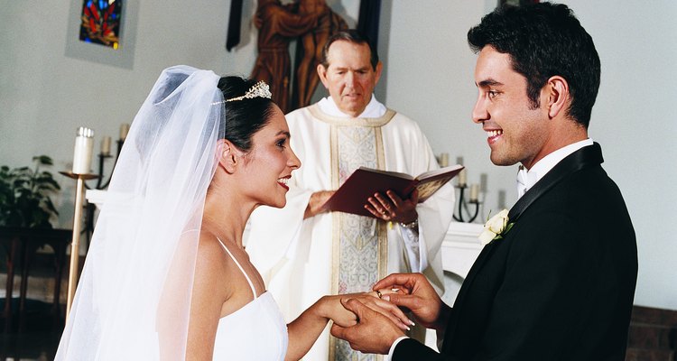 Bride and Groom Exchange Rings in Church Ceremony