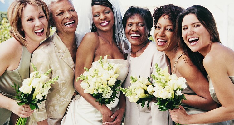 Portrait of Bride Standing With Mothers and her Bridesmaids