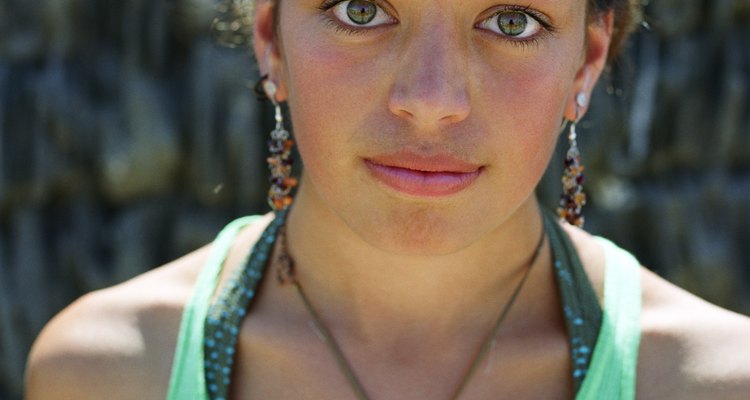 Young woman wearing vest top, portrait, close-up