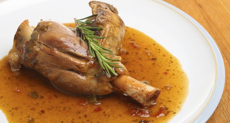 Lamb Shank Cooked in Wine & Herb Sauce