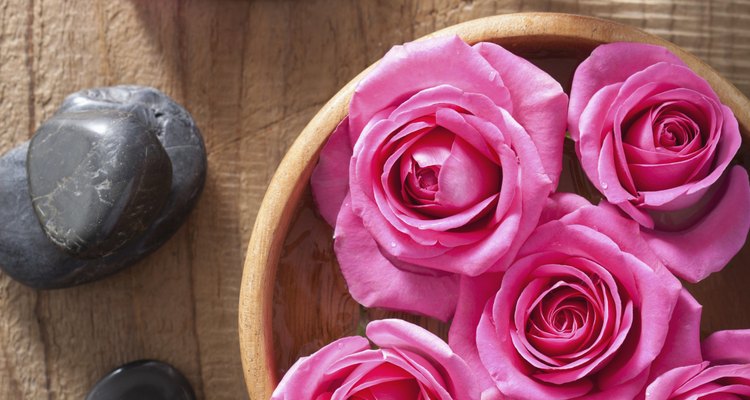 Roses provide beautiful additions to a bowl centrepiece.